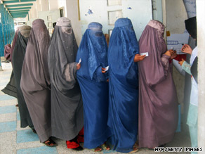 Afghan women line up this month in Kandahar to learn how to vote in the August 20 elections.