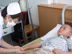 A Chinese boy gets treated for blood poisoning in Shaanxi province Aug. 15.