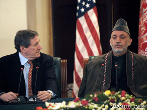 Afghanistan President Hamid Karzai, right, and Richard Holbrooke at a meeting in Kabul on February 15.