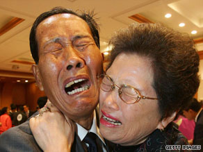 North Korean Yun Young-Seob hugs his South Korean sister Yun Bok-Seob at a 2007 reunion in North Korea.