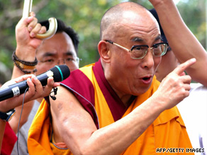The Dalai Lama visits the typhoon-hit village of Hsiaolin, in Kaohsiung county, southern Taiwan on Monday.