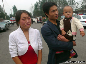 Family members arrive to find out the fate of miners Pingdingshan, China, on Tuesday.