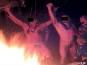 Images released by a watchdog group show raucous partying and sexual hazing by private embassy guards.