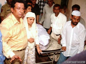 Relatives collect the body of Ishrat Jehan from Civil Hospital in Ahmedabad on June 18, 2004.