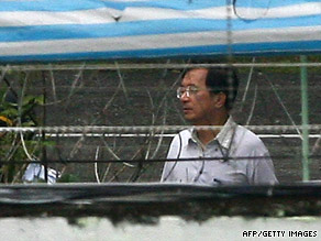 Wheelchair-bound Taiwan former first lady Wu Shu-chen leaves a hospital in Panchiao, Taiwan, in May.