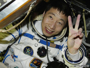 Back to Earth: Yang Liwei faces the cameras on returning to Earth in 2003.