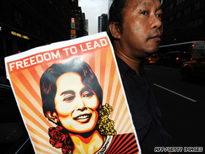 A Myanmar pro-democracy supporter displays a poster outside the United Nations in New York.