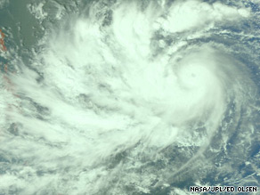 A NASA satellite image shows Typhoon Parma gathering strength over the Pacific.