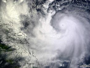 A NASA satellite image shows Typhoon Parma as it headed toward the Philippines on Friday.