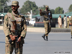 Pakistani soldiers patrol outside the main gate of army headquarters in Rawalpindi on Sunday.