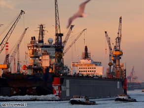 Snow-covered ice floats down the Elbe river in Hamburg, Germany, as the temperature plummets.