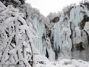 A waterfall frozen in Croatia by the colder-than-average winter.