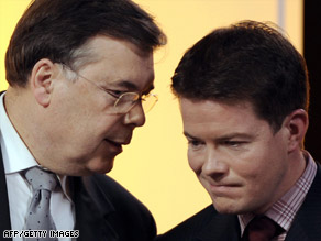 Iceland's Prime Minister Geir Haarde, left, talks with business minister Bjorgvin Sigurdsson in October.