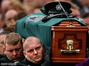 Stephen Carroll's coffin is carried from St Therese's chapel in Banbridge, Northern Ireland, on March 13.