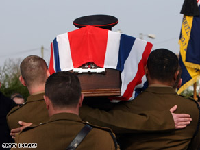 Soldiers Cengiz Azimkar, left, and Mark Quinsey were killed at a base in Northern Ireland.