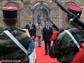 U.S. President Barack Obama and French President Nicolas Sarkozy take part in Friday's ceremonies.