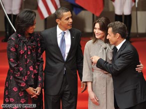 The Obamas and the Sarkozys pose for photos Friday in Strasbourg.