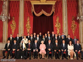 Just after this photo was taken, the Queen, center, appears to get annoyed with Silvio Berlusconi.