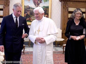 Pope Benedict XVI is flanked by Prince Charles and his wife Camilla during their meeting at the Vatican.
