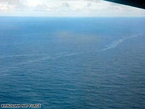 Image released by the Brazilian Air Force shows oil slicks in the water near a debris site.