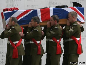 Soldiers from the Welsh Guards carry the coffin of Maj Sean Birchall, killed on patrol in Afghanistan in June.