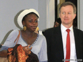 Samantha Orobator with UK ambassador to Laos at Vientiane's Wattay airport on August 6.