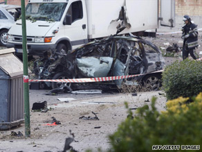 The wreck of a car outside a civil guards barracks in the city of Burgos on July 29.