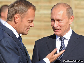 Russian Prime Minister Vladimir Putin (right) chats with his Polish counterpart Donald Tusk in Poland on Tuesday.