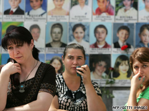 Mourners visit the Beslan school gymnasium on the fifth anniversary of the massacre.