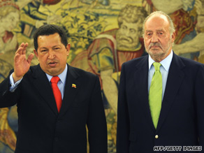 Spanish King Juan Carlos, right, welcomes Venezuelan President Hugo Chavez to Madrid on Friday.