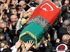 Relatives carry the coffin of Osman on Saturday after his funeral ceremony in Istanbul.