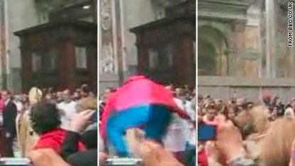 Woman knocks down pope