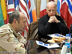 Vice President-elect Joe Biden, right, is briefed Sunday by  International Security Assistance Force Maj. Gen. Mart C. de Kruif in Kandahar, Afghanistan.