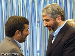 Khaled Meshaal, left, embraces Iran's Supreme Leader Ayatollah Ali Khamenei while visiting Iran.