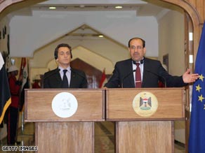 French President Nicolas Sarkozy and Iraq's PM Nuri al-Maliki.