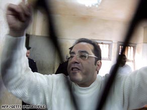 Nour reacts after being convicted in December 2005.