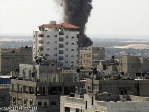 Smoke rises over the Gaza border town of Rafah after an Israeli air attack Wednesday.