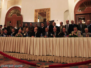 Leaders of rival Palestinian factions discuss the results of reconciliation talks in Cairo, Egypt, on Thursday.