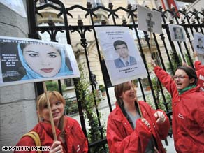 Reporters Without Borders members demonstrate on Sunday at the Iranian Embassy in Paris, France.