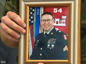 The Camp Liberty shooter has been identified as Army Sgt. John M. Russell of Sherman, Texas.