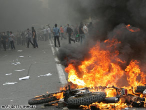 Supporters of defeated Iranian presidential candidate Mir Hossein Mousavi protest in Tehran on June 13, 2009.