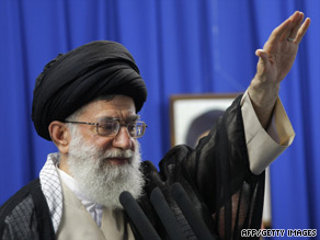 Mir Hossein Mousavi (center) is surrounded by supporters in Tehran, Iran, on Thursday.