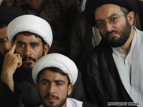 Iranian clerics listen to Grand Ayatollah Ali Akbar Khamenei at Tehran University earlier today