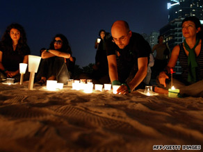 Iranians protest Tuesday in Tehran despite a heavy security presence.