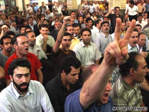 Iranian opposition supporters shout slogans during a gathering in Tehran on Sunday.