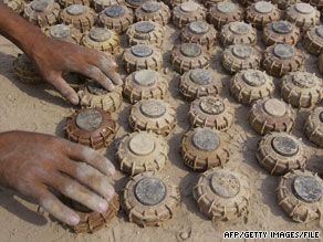 Landmines are laid out after being turned in at an Iraqi police station in 2004.