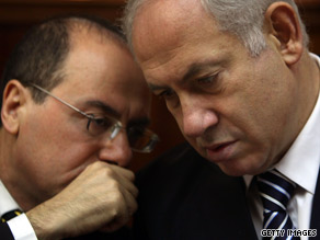 Israeli PM Benjamin Netanyahu consults with an advisor regarding the controversial construction project.