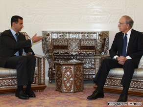 U.S. special envoy George Mitchell, right, and Syrian President Bashar al-Assad meet in Damascus on Sunday.