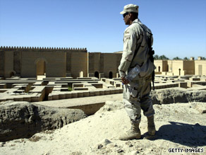 An U.S. soldier looks over the ancient city of Babylon in Iraq in 2004.