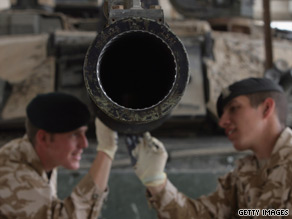 Mechanics prepare a tank ready to shipped back to the UK from Basra.